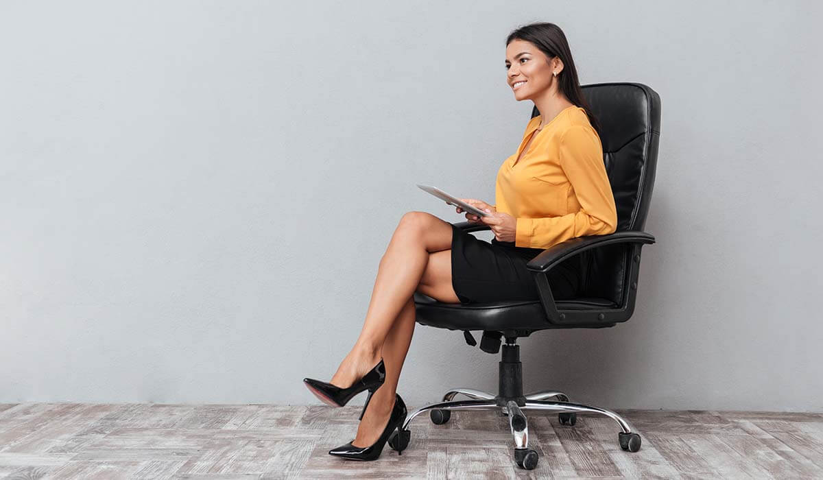 Woman sitting on an office chair